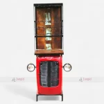 Vintage red tractor transformed into a stylish bar cabinet with shelves, ideal for displaying wine bottles.