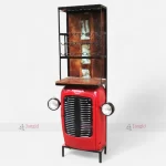 Vintage red tractor transformed into a stylish bar cabinet with shelves, ideal for displaying wine bottles.