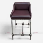 Water Pipe Iron-legged bar stool with a rexine leather seat in a modern design.