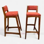 Two Wooden bar stool with red upholstered seat