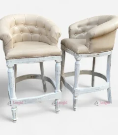 Two elegant white upholstery bar stools with tufted backs