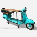 Retro blue scooter transformed into a wooden table, vintage industrial furniture piece
