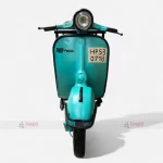 Vespa scooter converted into a vintage bar table, showcasing automobile furniture and vintage industrial furniture makeover