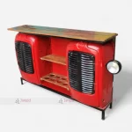 Unique red industrial tractor bar table counter featuring working headlights and ample cabinet storage, perfect for bars and cafes with a vintage flair.