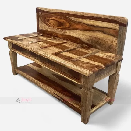 Hotel guest room wooden luggage rack with built-in luggage shelf.