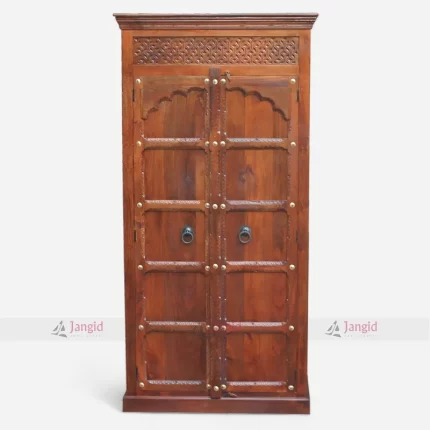 Wooden Hand Carved Heritage Hotel Room Wardrobe Design crafted by furniture manufacturer & supplier in India.