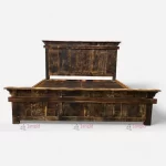 Rustic Burnt Antique Wood Hotel Double Bed by Hotel Room Bed Supplier in Jodhpur, India.