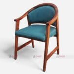 Modern armchair with a solid wood frame and a comfy blue cushion, ideal for hotels, cafes, or lounges.