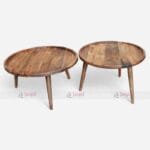 Two stylish round wooden coffee tables with wooden legs, made from mango wood, offering elegance and functionality for any space.
