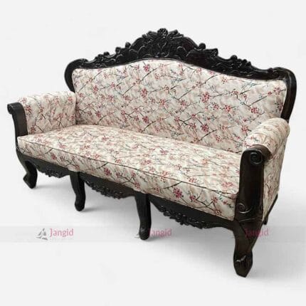 A luxurious 3-seater sofa with an intricate floral design, handcrafted from mango wood, perfect for hotels and lounges.